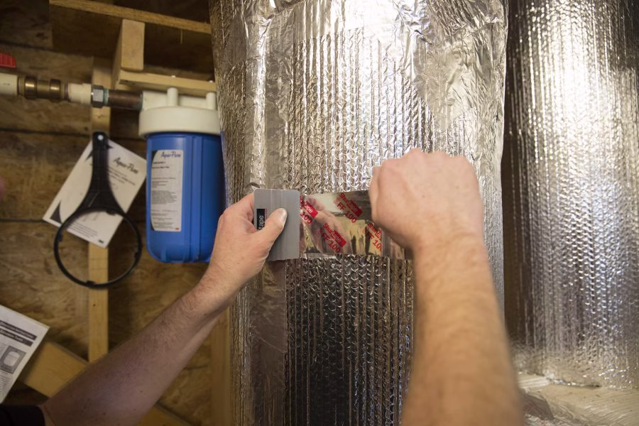 Tape for sealing reflective insulation