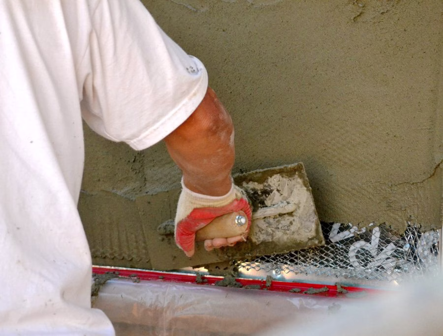 What does stucco tape failure look like