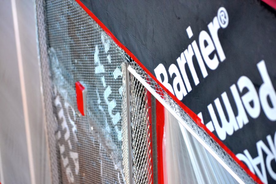 Water resistant stucco tape