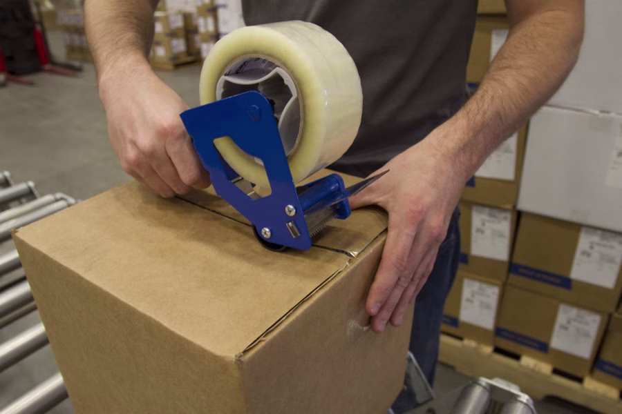 what is the proper way to manually apply packaging tape