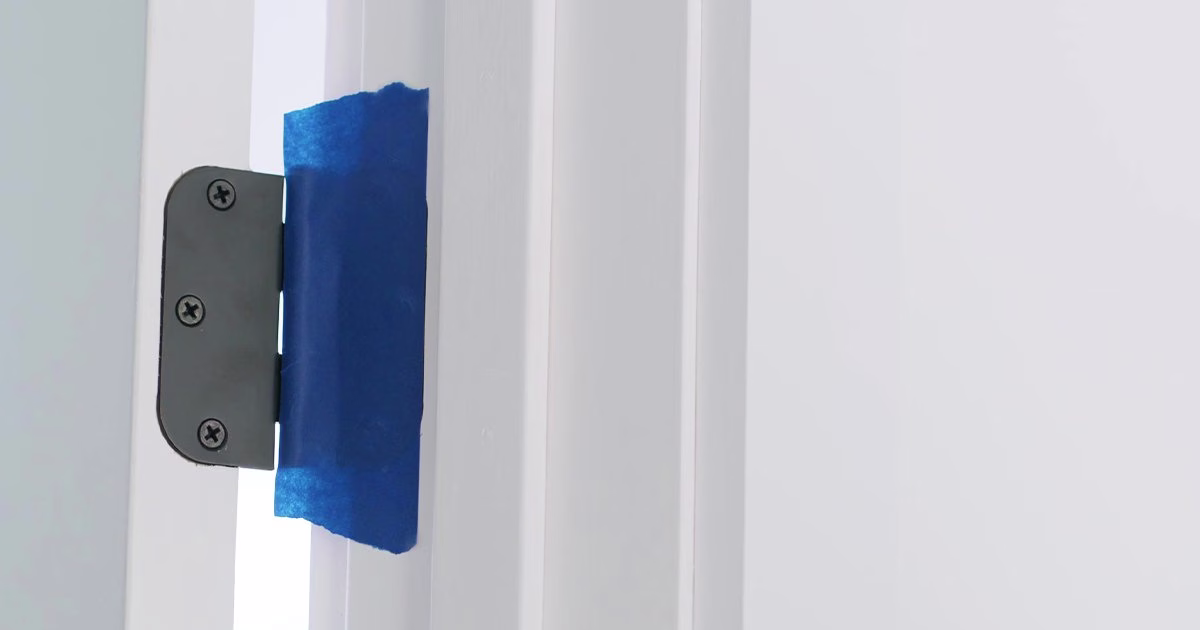 Masking tape on door hardware